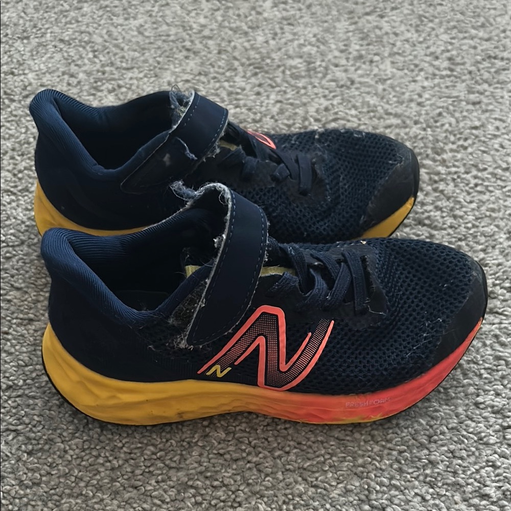 New Balance Black and Yellow Sneakers Athletic Design